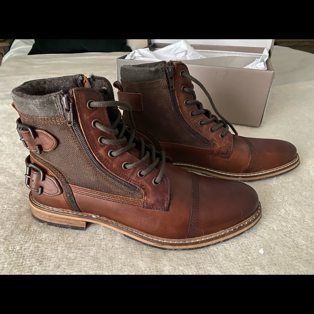 Brand New in box. Gorgeous boots, size 9